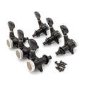 Set of six black locking guitar tuners with silver tuning knobs and included mounting screws.