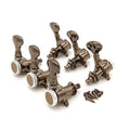 Set of six metallic guitar tuning pegs with six screws on a white background.