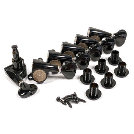 Six black guitar tuning pegs with bushings and screws arranged on a white background.
