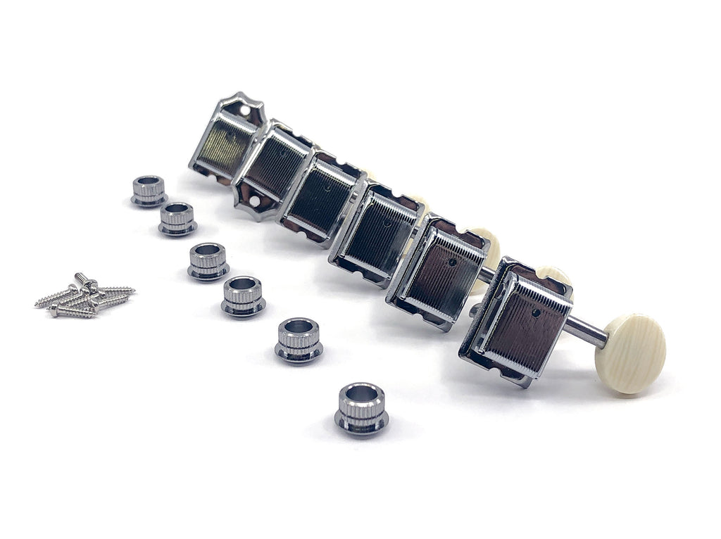 Set of six chrome inline guitar machine heads with off-white oval buttons and mounting hardware on white background