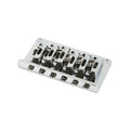 Silver metal guitar bridge with six adjustable saddles and screws on a white background.