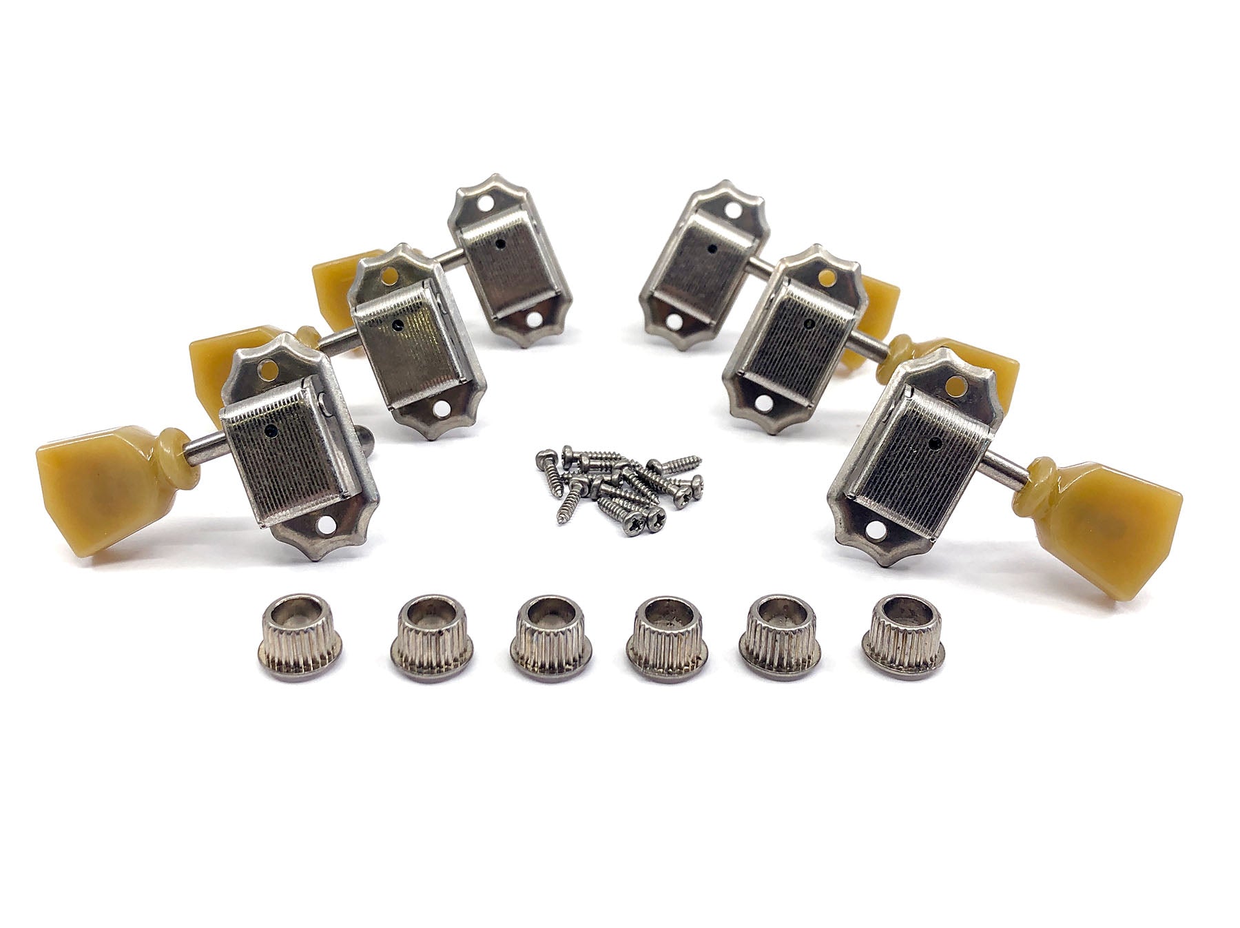 Set of six silver guitar tuning machines with yellow-beige keystone buttons, screws, and bushings laid out on white background.