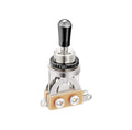 Metal toggle switch with black tip and screw terminals on a beige base on a white background.