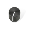 Black round rotary knob with ridged sides and a white indicator line on top on a white background.