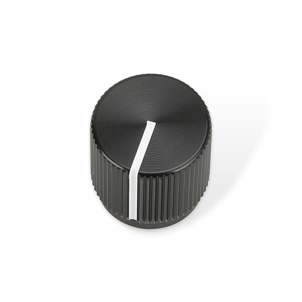 Black round rotary knob with ridged sides and a white indicator line on top on a white background.