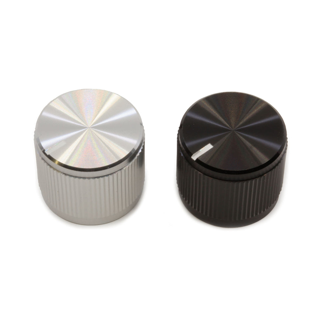 Two round metal knobs with knurled sides, one silver and one black, shown from the top and side.