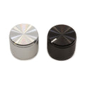 Two round metal knobs with knurled sides, one silver and one black, shown from the top and side.