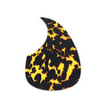 Black and yellow spotted shell shaped guitar pickguard on a white background.