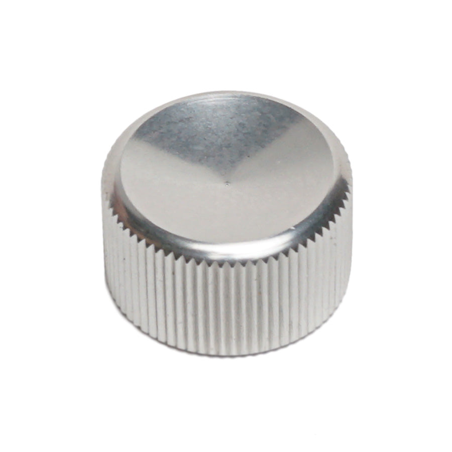 Polished silver metal control knob with vertical ridges on the side and smooth top surface.