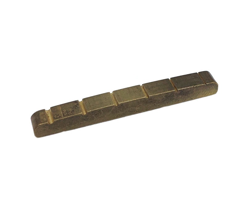 A brass-colored metal guitar nut with five pre-slotted spaces placed against a white background.