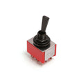 Red rectangular toggle switch with black lever and metal mounting nut on white background.
