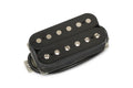 Black humbucker guitar pickup with four-conductor wire and metal pole pieces on white background.