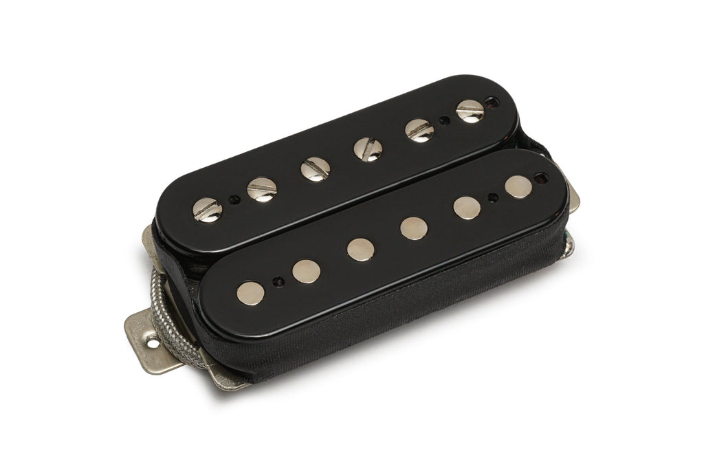 Black guitar humbucker pickup with silver screw poles and wire lead.
