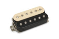 Electric guitar pickup with cream and black bobbins and exposed pole screws, shown from an angled top view.
