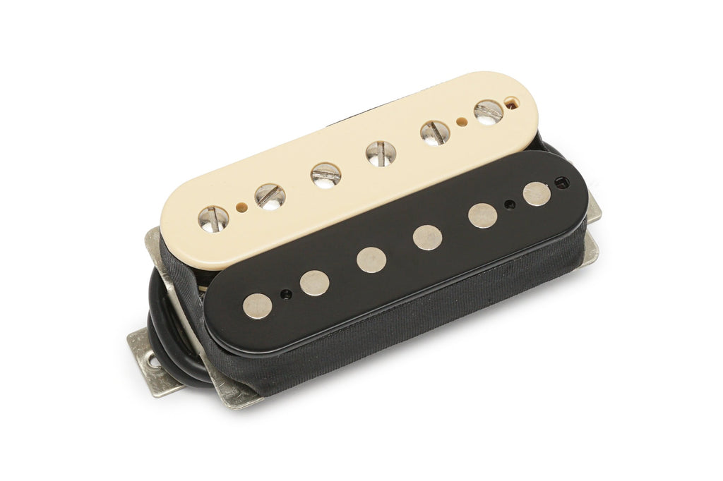 Electric guitar humbucker pickup with ivory and black bobbins and six adjustable pole pieces on each coil.
