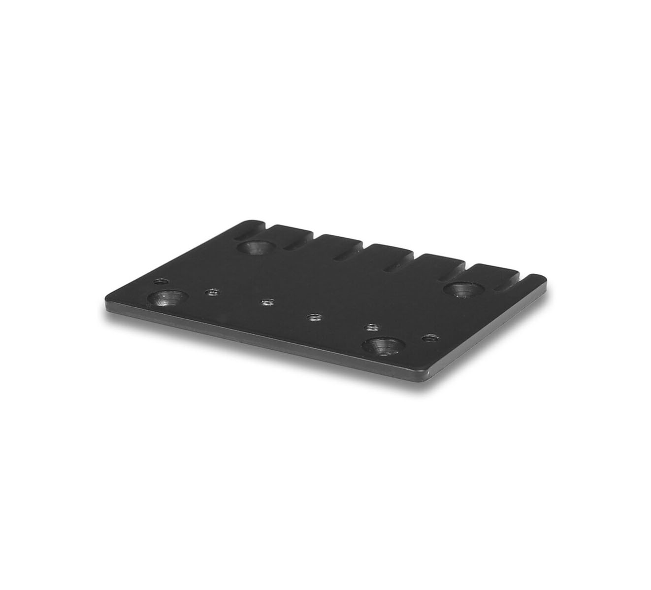 Black metal rectangular guitar bridge plate with multiple screw holes and five saddle slots.