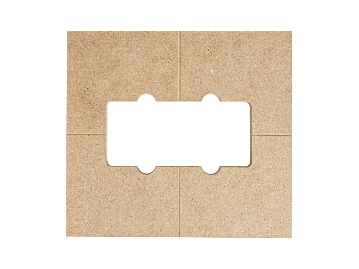 Beige colored wooden template with a pickup-shaped cutout and some scoring lines on its surface.