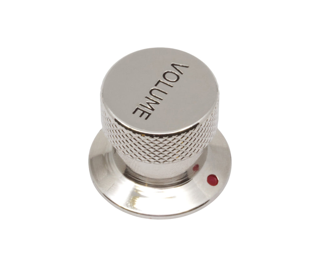 Chrome metal rotary knob labeled VOLUME with textured sides and a red indicator dot on the base.