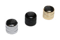 Three knurled cylindrical knobs with black dome tops in silver, black, and gold finishes.
