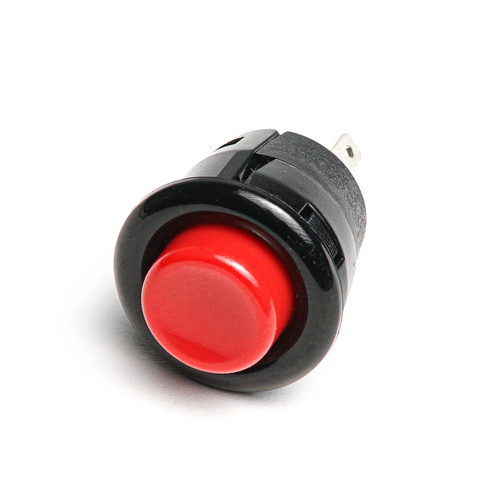 Red round push button switch with black housing and silver tab connectors on white background.