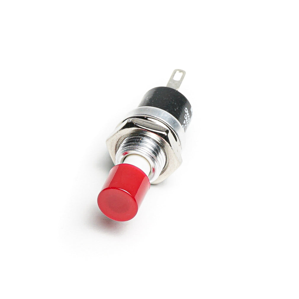 Small momentary push button switch with a red button and metal body with a tab terminal.