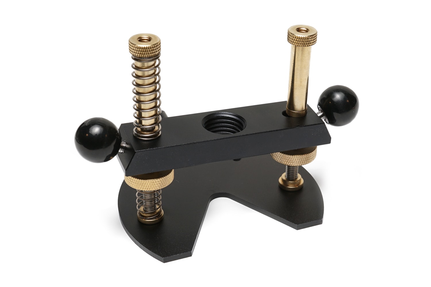 Black metal base part with two black ball knob handles, gold threaded screws, and springs