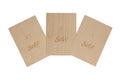 Three light wooden shims with engraved angle measurements and Solo Guitars logo arranged side by side.