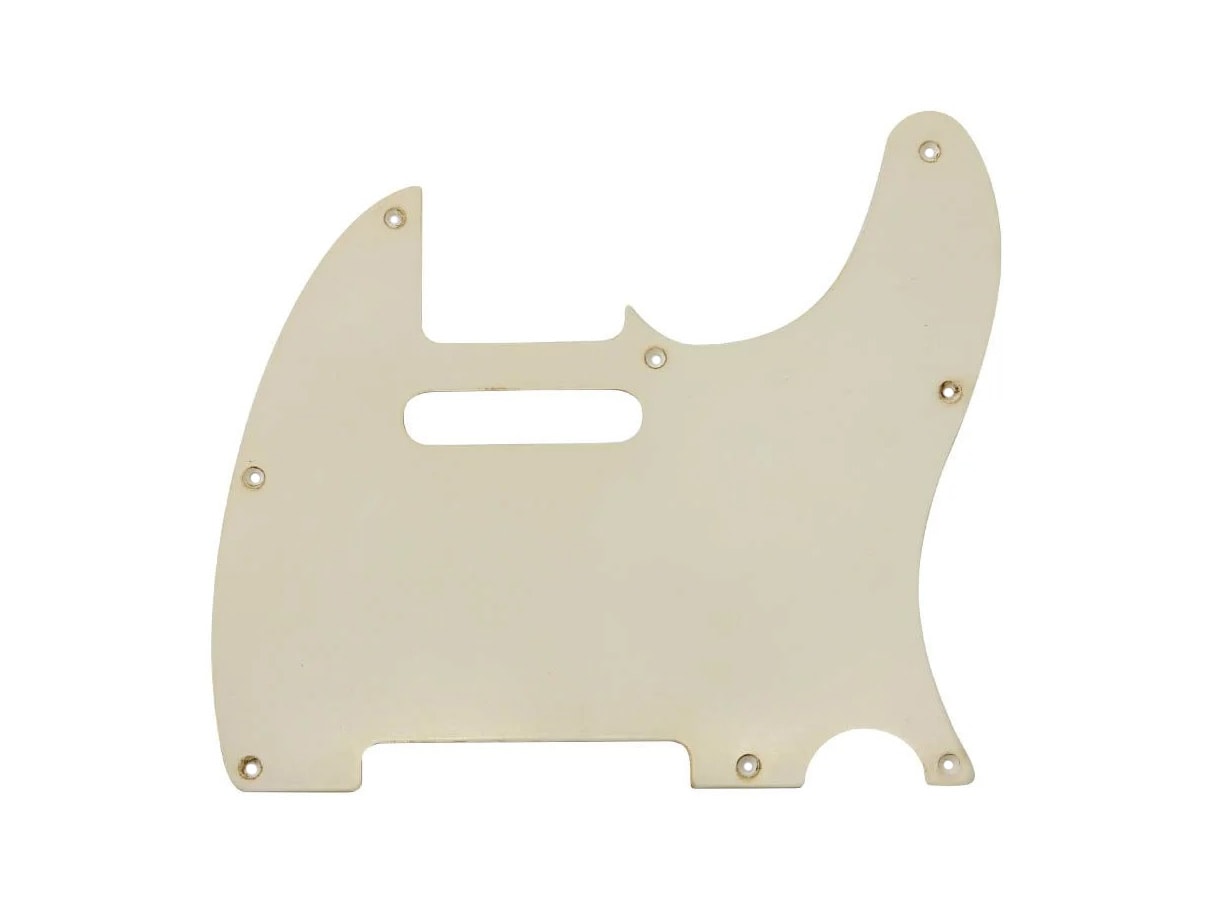 Cream colored guitar pickguard with multiple screw holes and pickup cavity cutout.