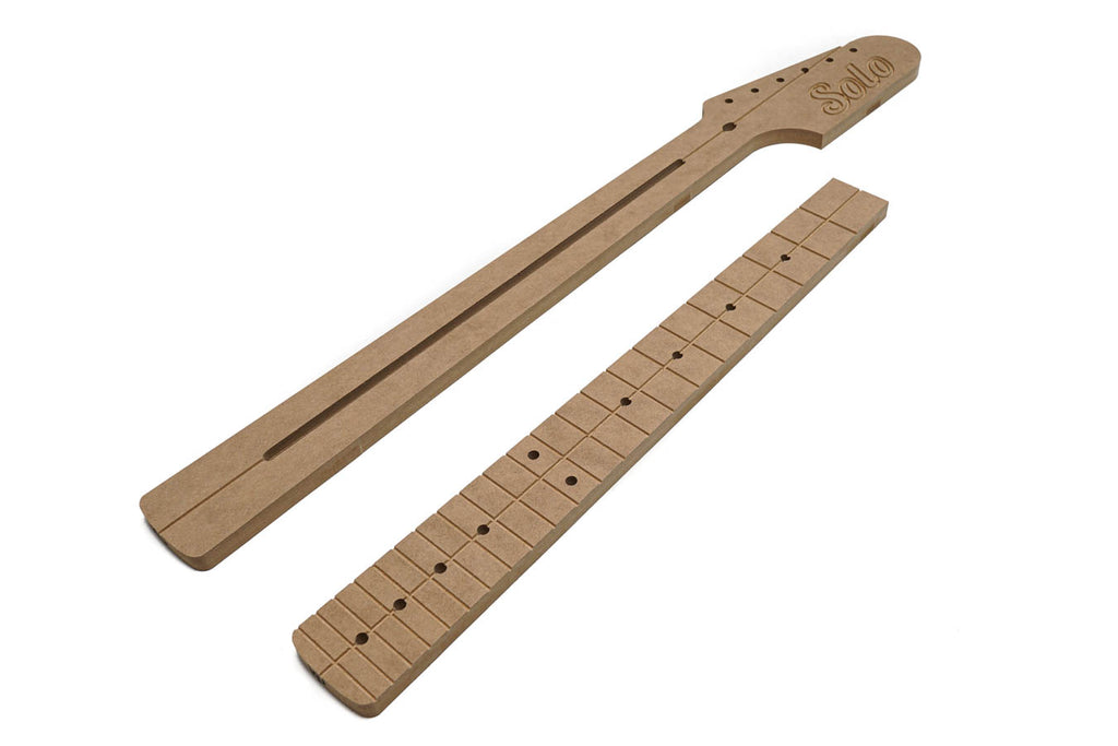 Two brown wooden templates resembling a guitar neck and fretboard with fret markers and the word Solo carved on the headstock template.