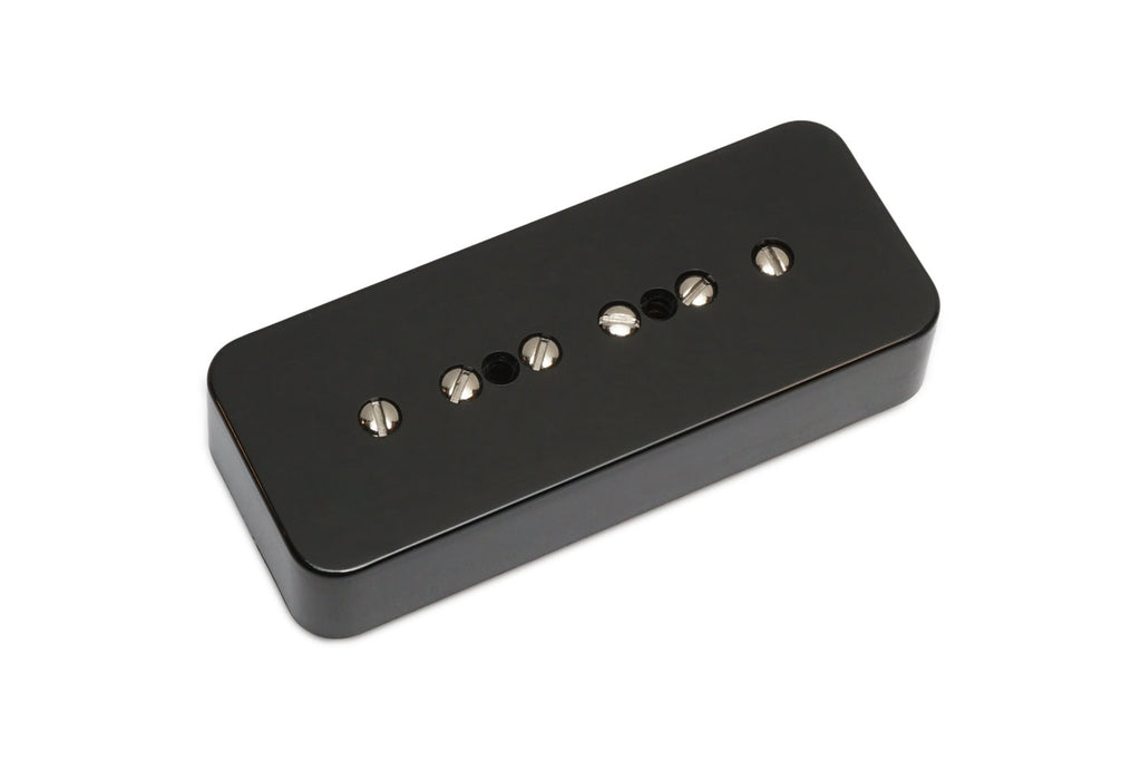 Black rectangular guitar pickup with six metal pole pieces in a row.