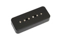 Black rectangular guitar pickup with six metal pole pieces in a row.