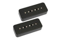 Two black rectangular guitar pickups with six adjustable screws each on a white background.