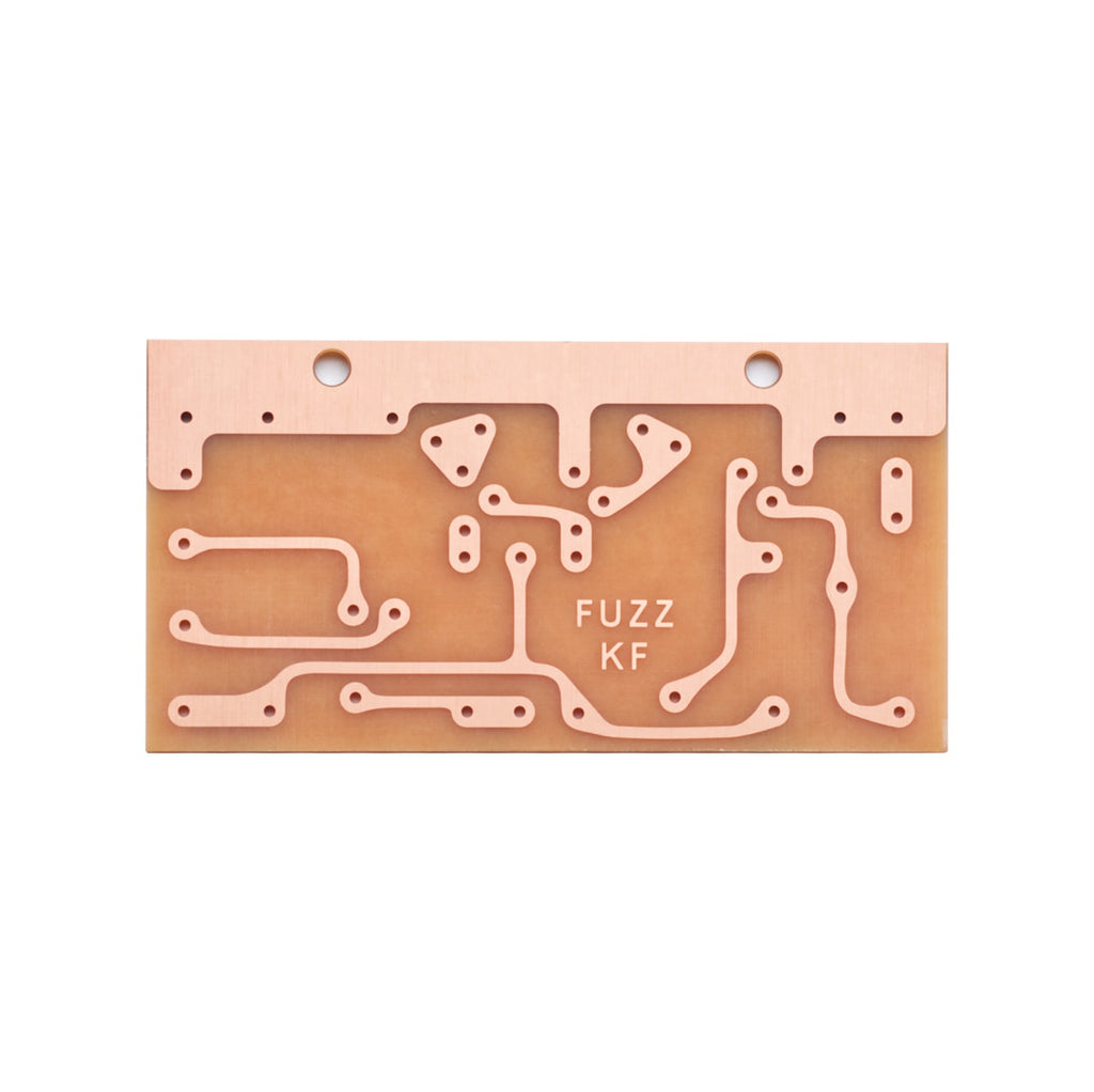 Rectangular printed circuit board with copper traces and text 'FUZZ KF'