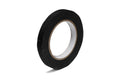 A roll of black tape with a brown cardboard core on a white background.