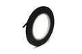 Roll of black fabric tape with a small loose end against a white background.