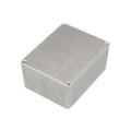 Closed gray metal rectangular pedal enclosure box with screws on each corner of the top panel.