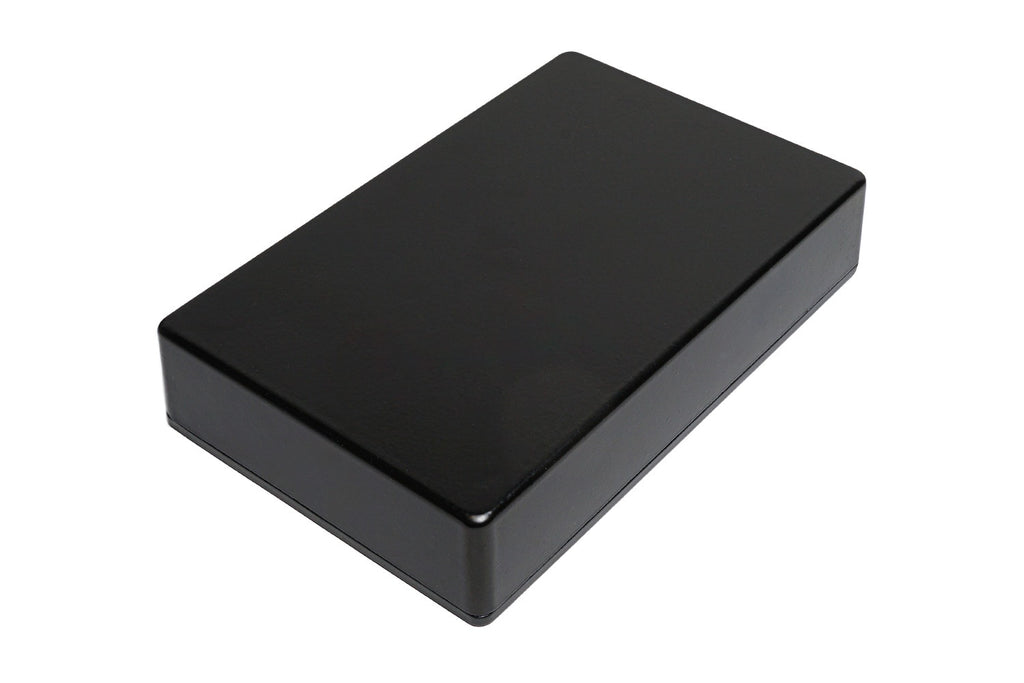 Large black rectangular metal pedal enclosure viewed at an angle on a white background.