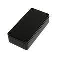 Small black rectangular metal enclosure with four corner screws, shown from an angled top view.