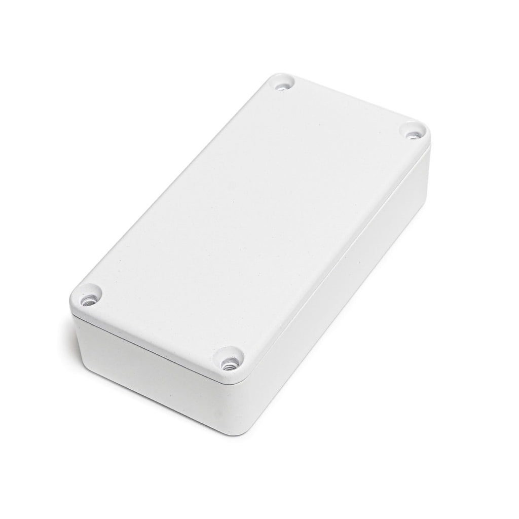 Small white rectangular metal enclosure with a closed lid and four corner screws visible.