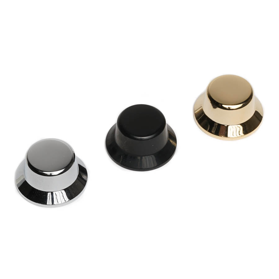 Three cylindrical control knobs in silver, black, and gold colors on a white background.