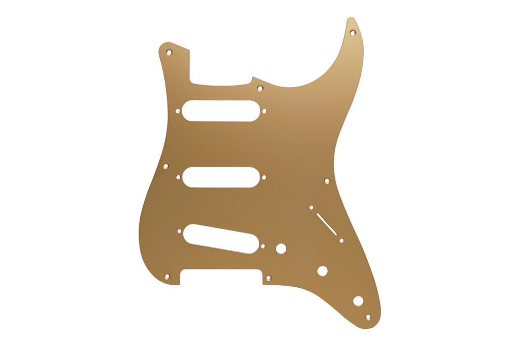 Gold colored metal pickguard with eight holes and cutouts for pickups and controls.