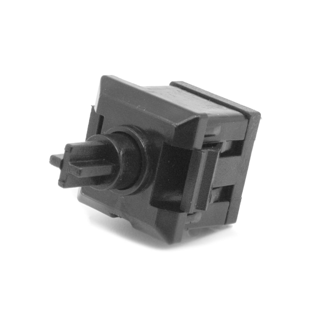 Black rectangular push button switch with a protruding actuator on a white background.