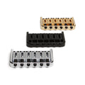 Three metal fixed guitar bridges in gold, black, and silver colors shown from an angled top view on white background.