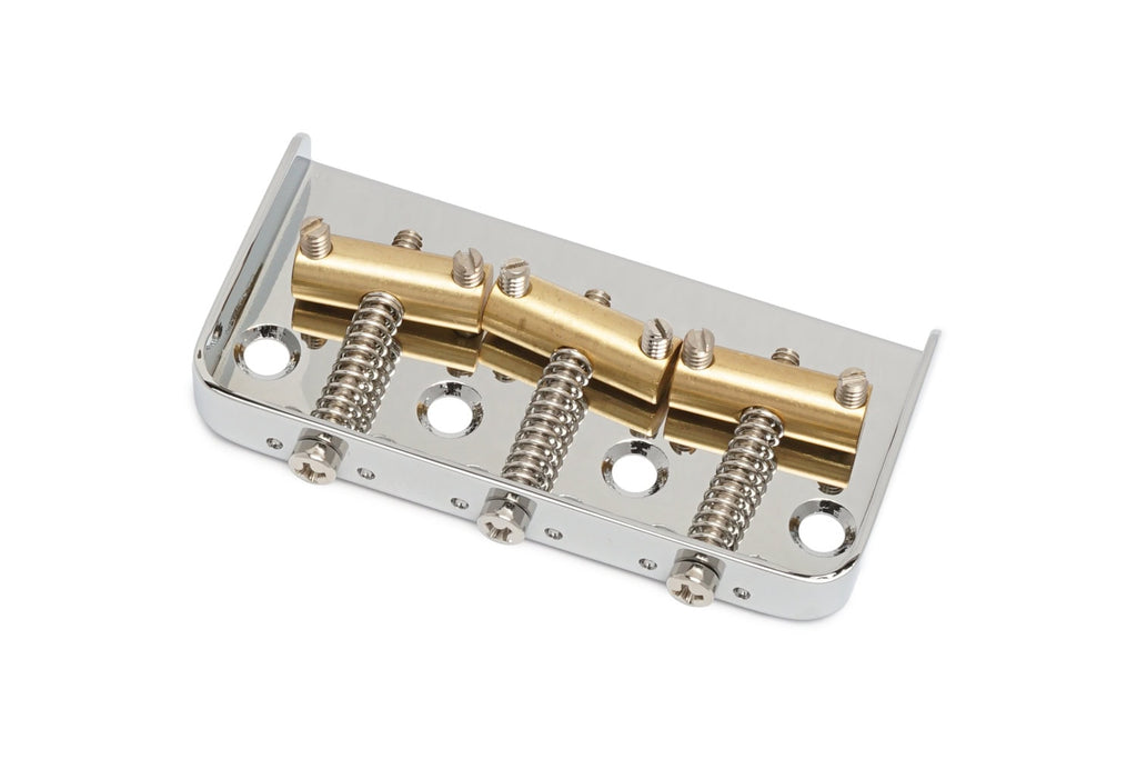 Chrome metal guitar bridge with three brass saddles and adjustment screws on a white background.