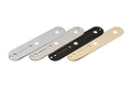 Four metal guitar control plates in silver, matte silver, black, and gold colors shown side by side.