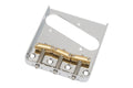 Chrome guitar bridge plate with three compensated brass saddles and mounting holes on a white background.