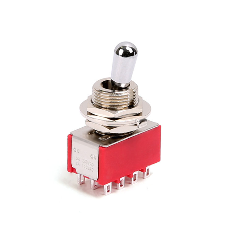 Red toggle switch with metal lever and multiple pin terminals on a white background.