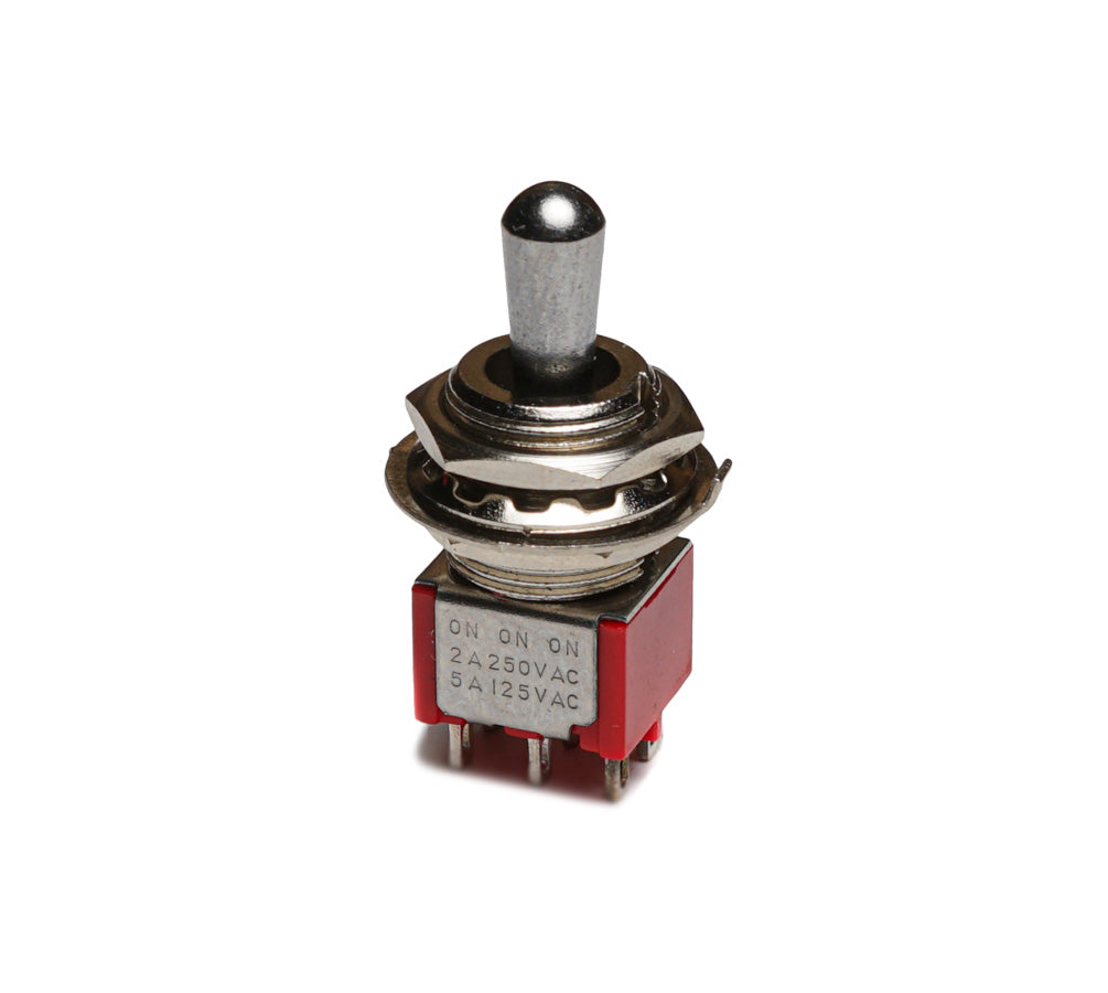 Metal toggle switch with red plastic housing and pin terminals on a white background.