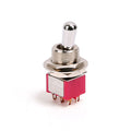 A metal toggle switch with red plastic base and six pin terminals, labeled with electrical ratings.