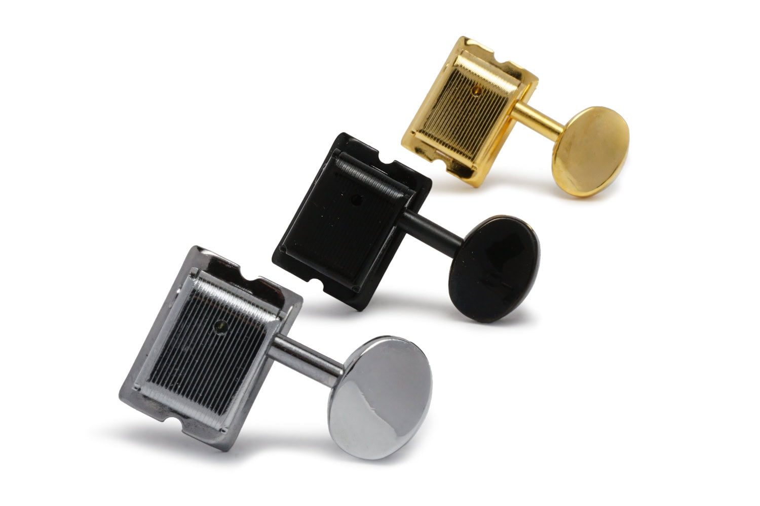 Three individual guitar machine heads in gold, black, and silver finish are shown on a white background.